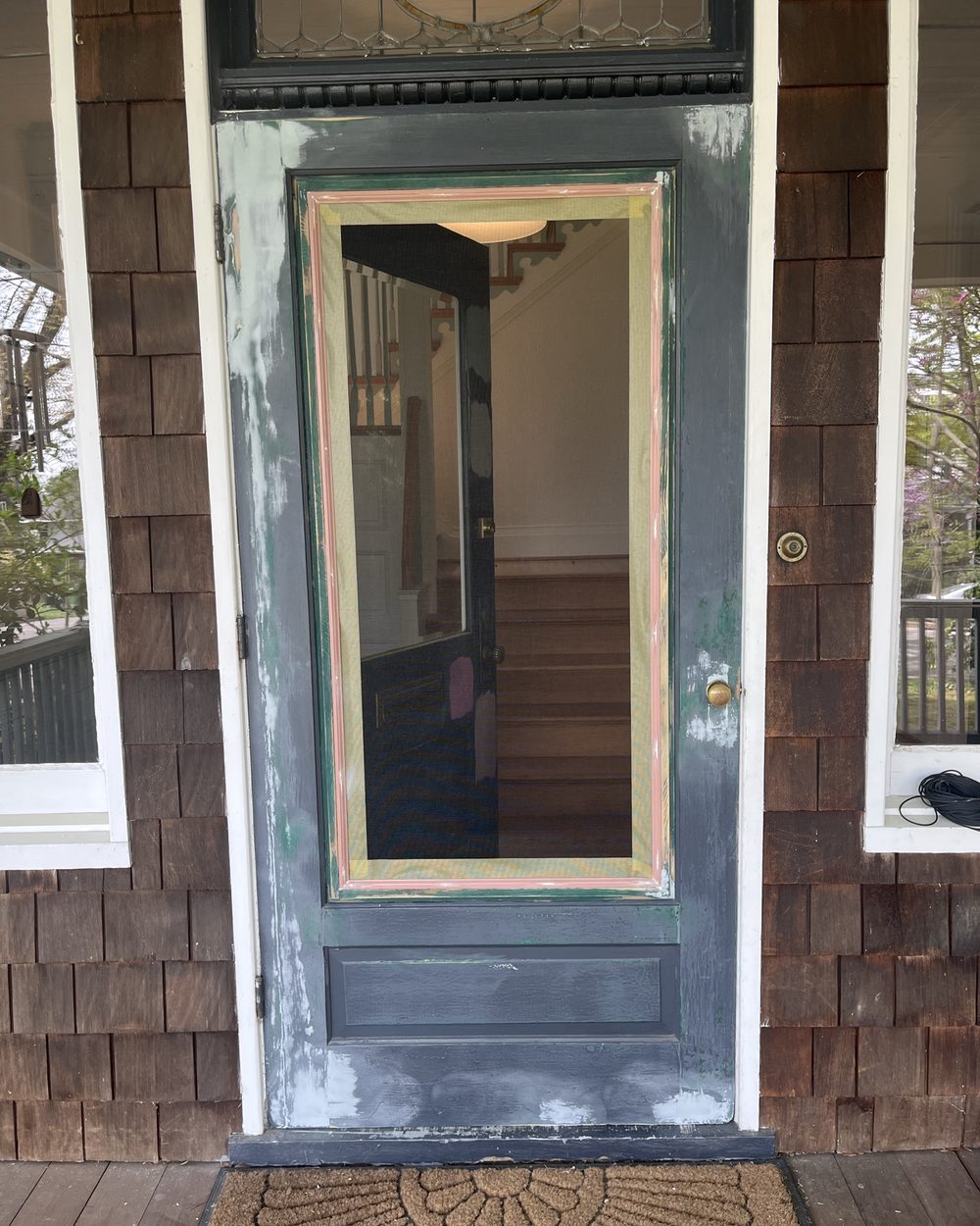 Weathered entry door before restoration